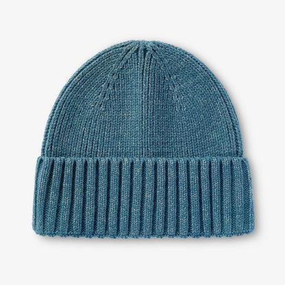 Turkos sotarmössa i Polylana®-garn, sedd framifrån.