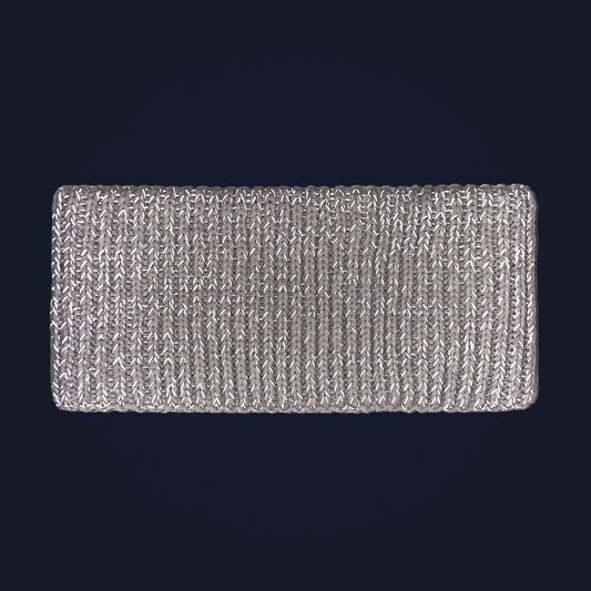 Beige reflexpannband som lyser upp i mörker tack vare det invävda reflexgarnet.