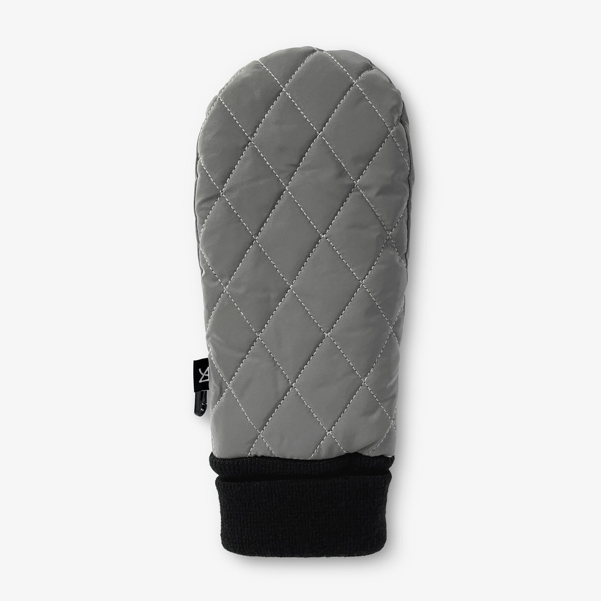 Quiltad tumvante i grå sedd från ovansidan med synligt quiltat mönster.